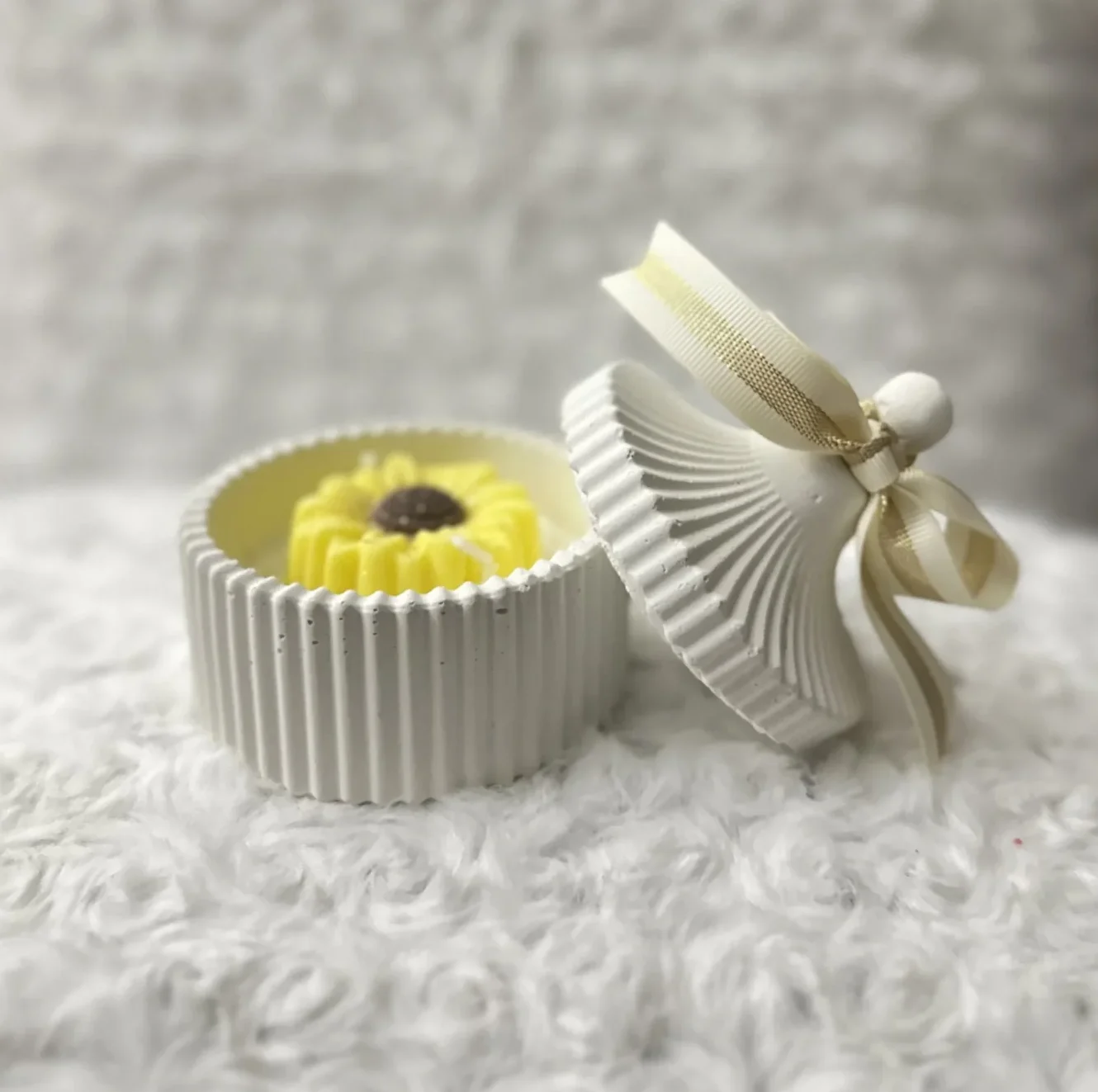 Stripped rounded concrete vessel for scented candle